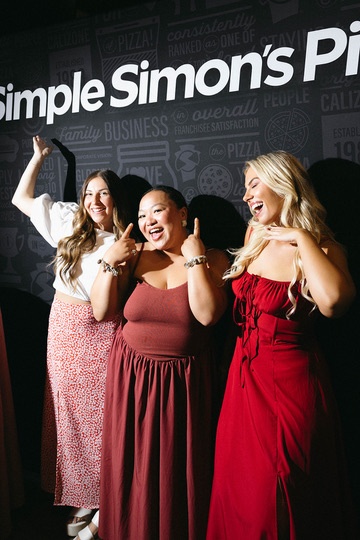 Guests at the Simple Simon's press wall
