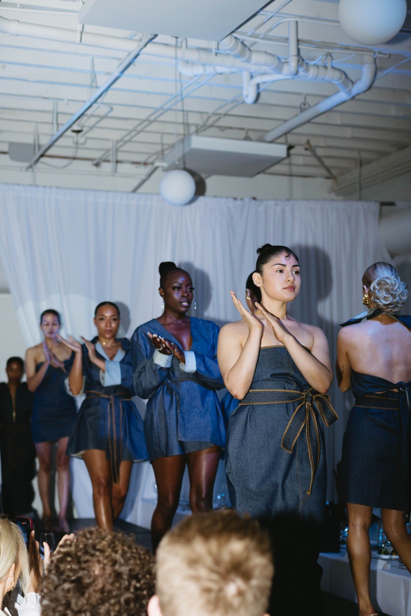 Models in denim taking their finale bow on the d.o.d runway