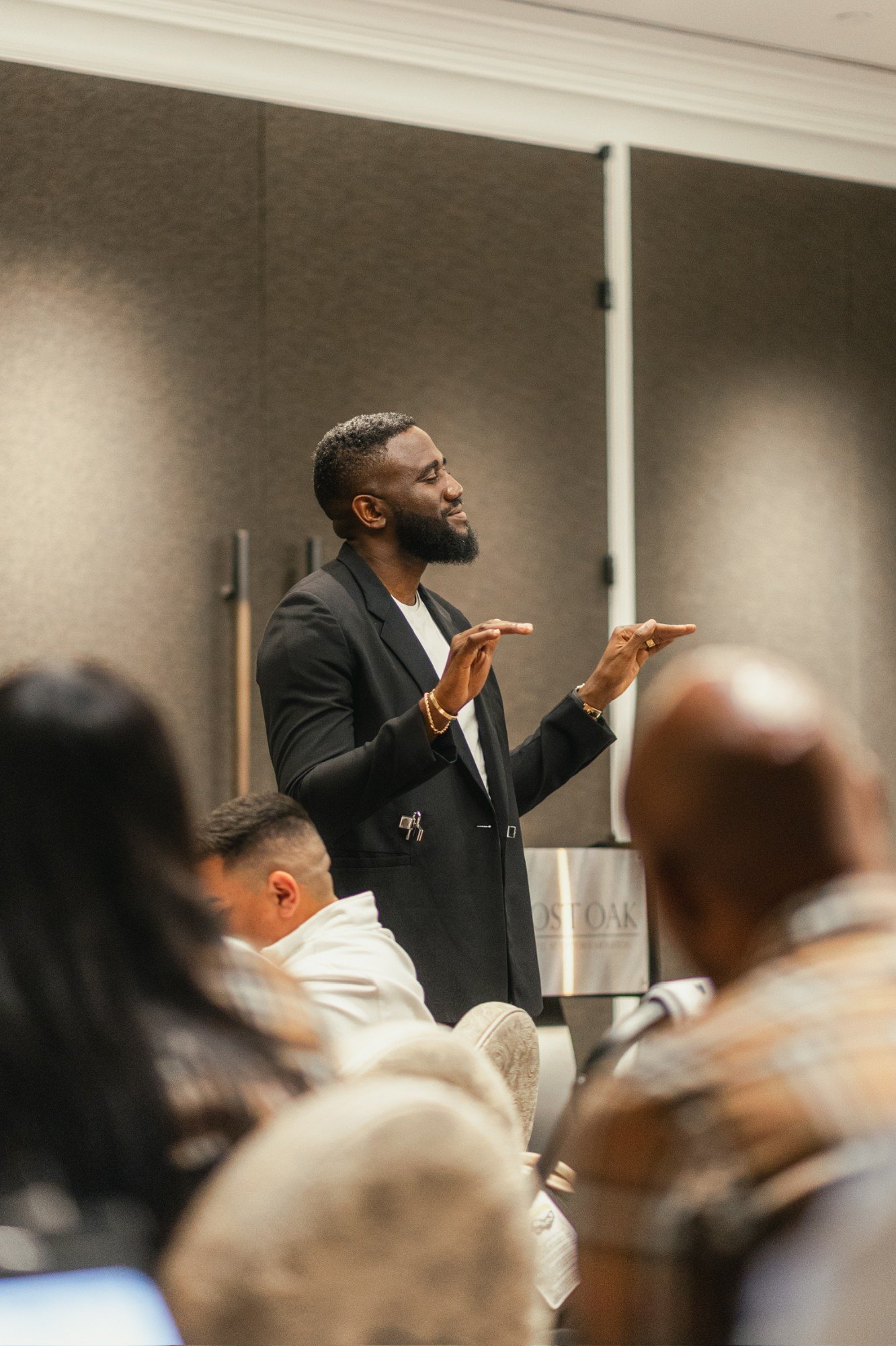 A speaker addresses the room during the Trove weekend sessions